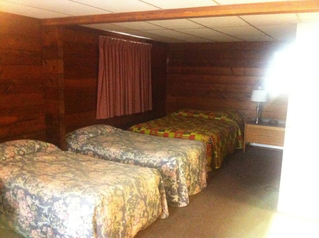 Raccoon Lodge Motel Sylvan Lake Værelse billede